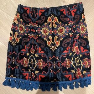 The cutest Zara mini skirt with fringing.